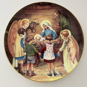 Away in a manger, collectible 8 1/2 inch plate signed and numbered
